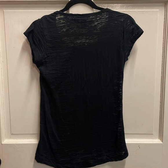 Rue 21 formfitting, black, sheer cap sleeve tee with front finger pocket details - Picture 6 of 6